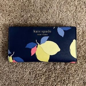 Kate Spade wallet. Beautiful smaller wallet. Perfect for spring/summer